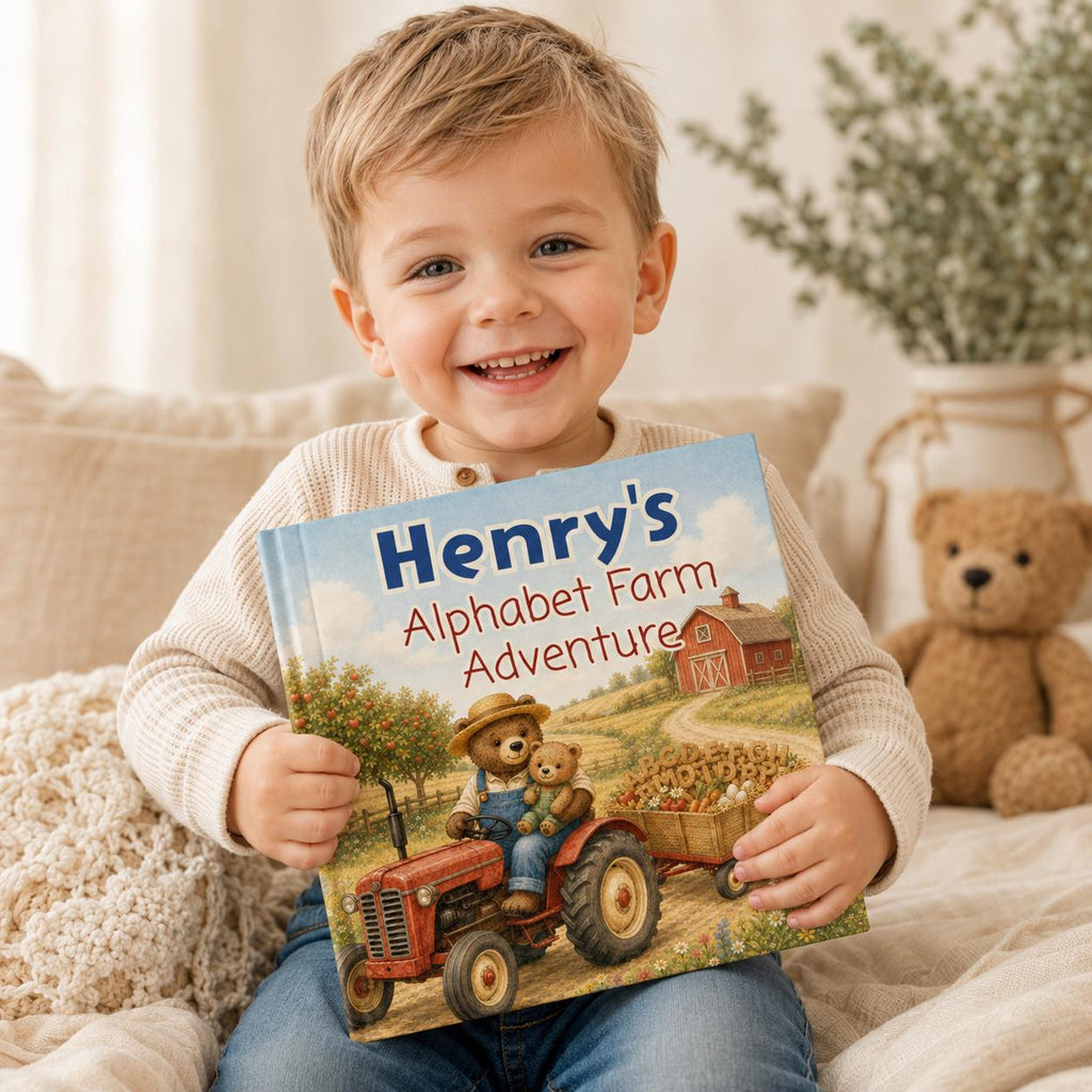 May include: A hardcover children's book titled Henry's Alphabet Farm Adventure. The cover features an illustration of a brown bear wearing a straw hat and blue overalls driving a red tractor, pulling a trailer filled with vegetables near a red barn.